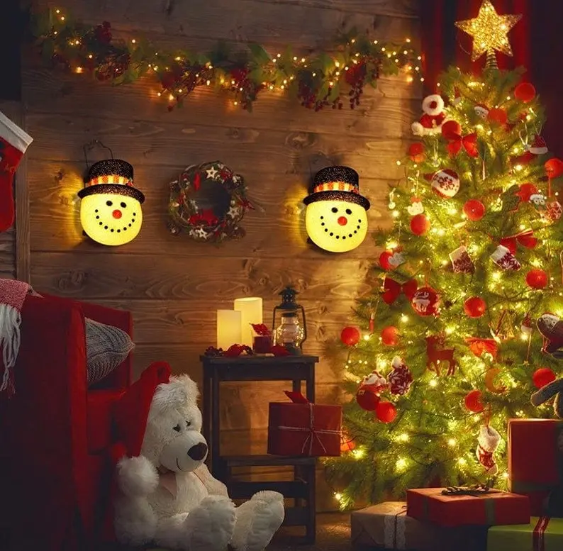 Snowman light cover on porch